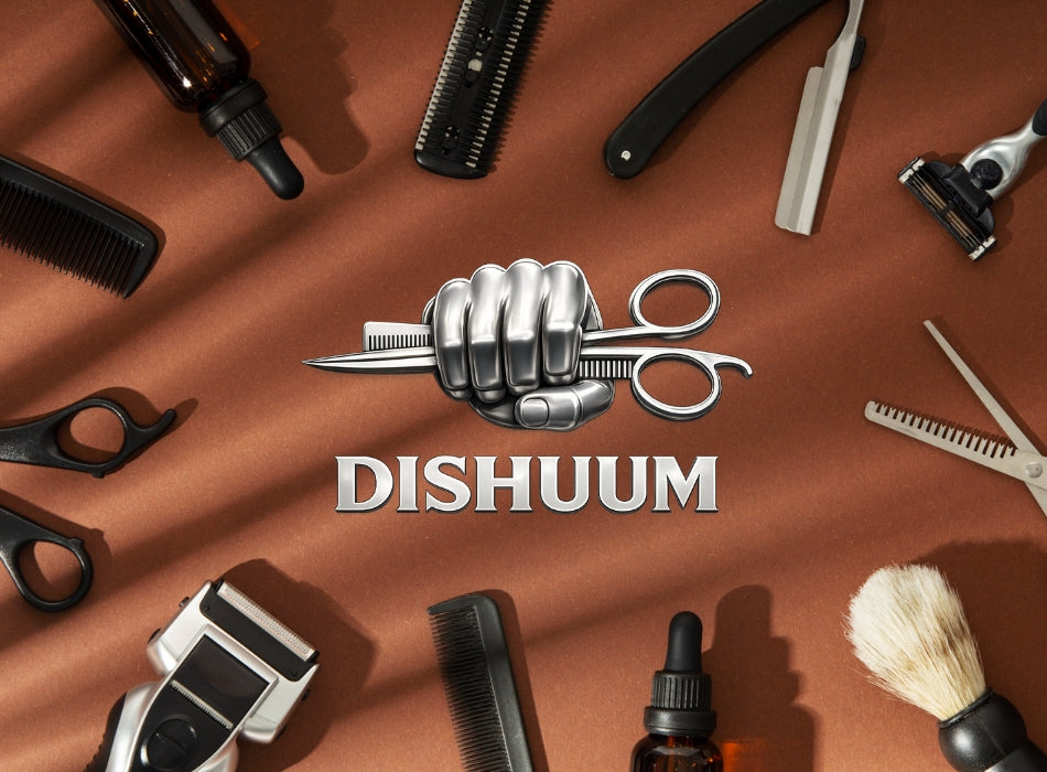 Dishuum barber tools and grooming equipment including scissors, razor, comb and shaving brush.